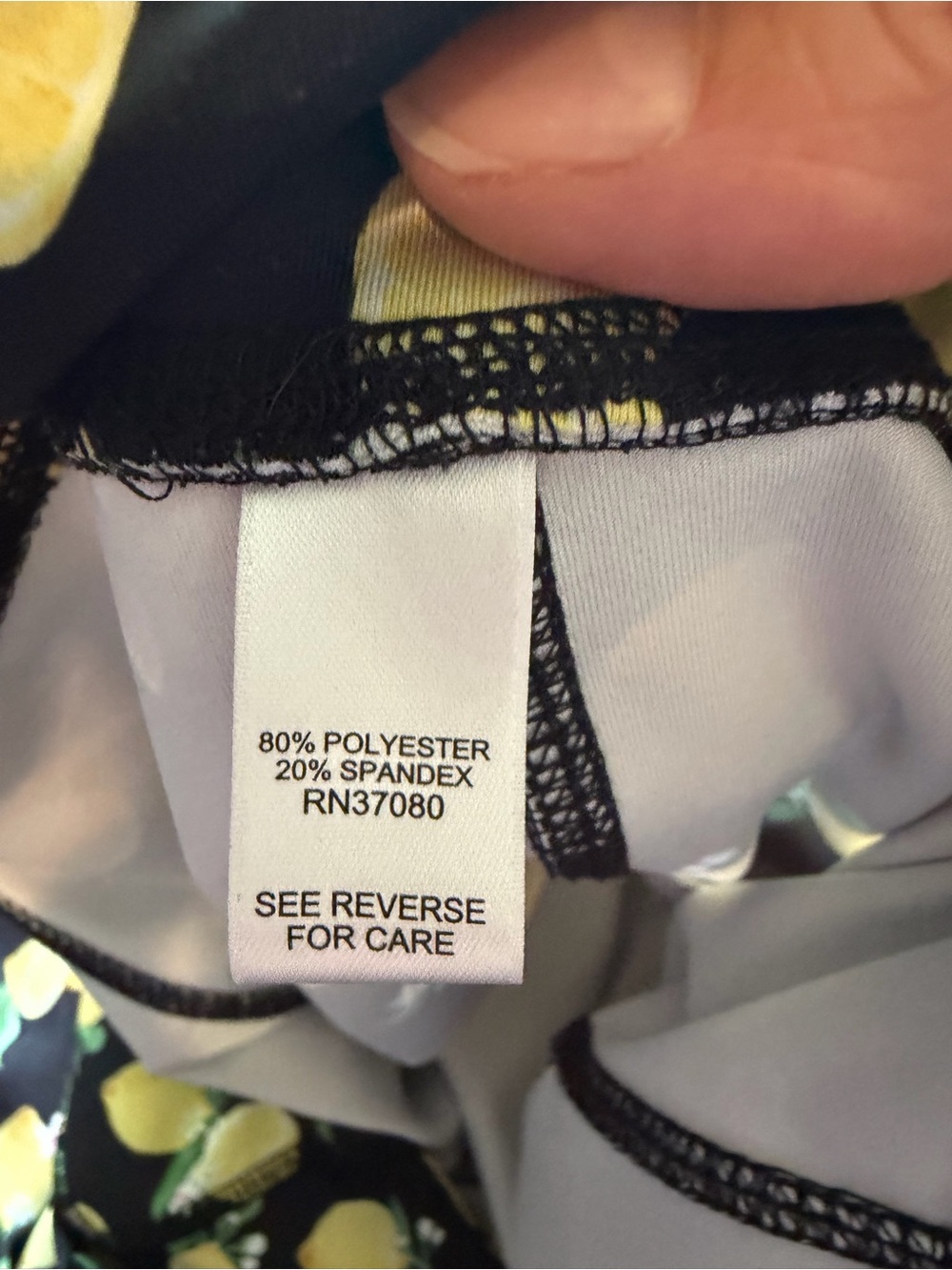3/$20 Live Well Lifestyle Black Cropped Leggings with Yellow Lemon Print - Picture 4 of 5